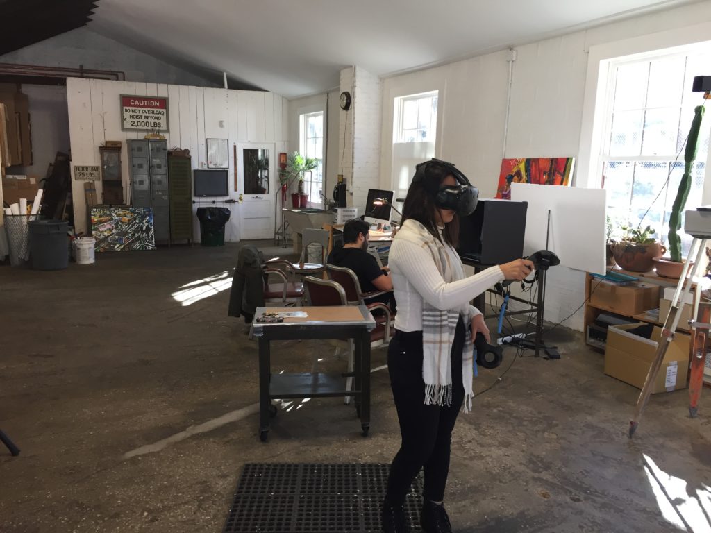 student using VR and controller