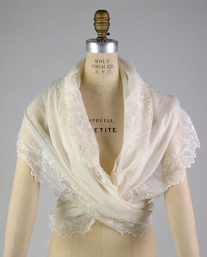 white sheer bolero shawl on dress form