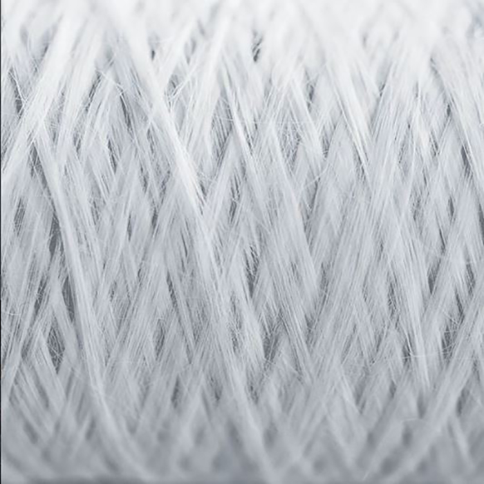 close-up of white fabric threads