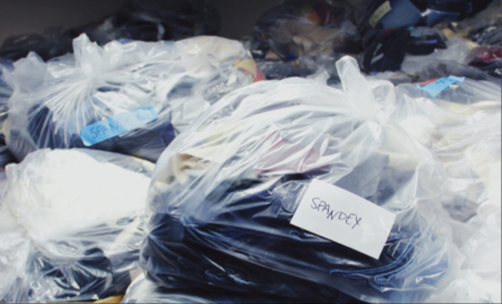 clothing in clear bags labeled as spandex