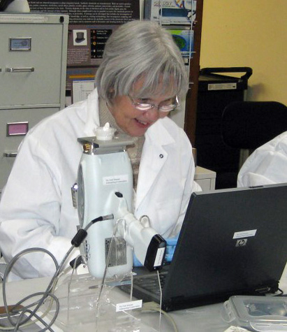 woman looking at computer in lab