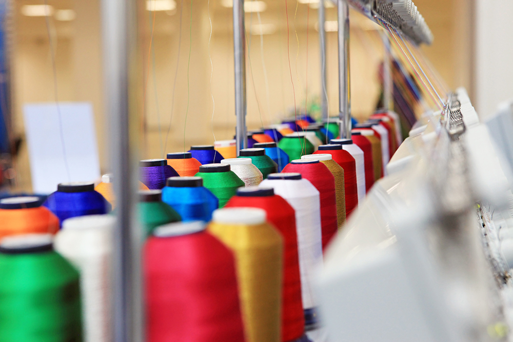 textile factory with spools of thread